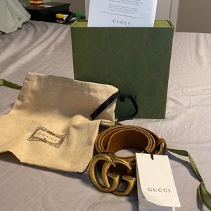 Gucci belt with big buckle.